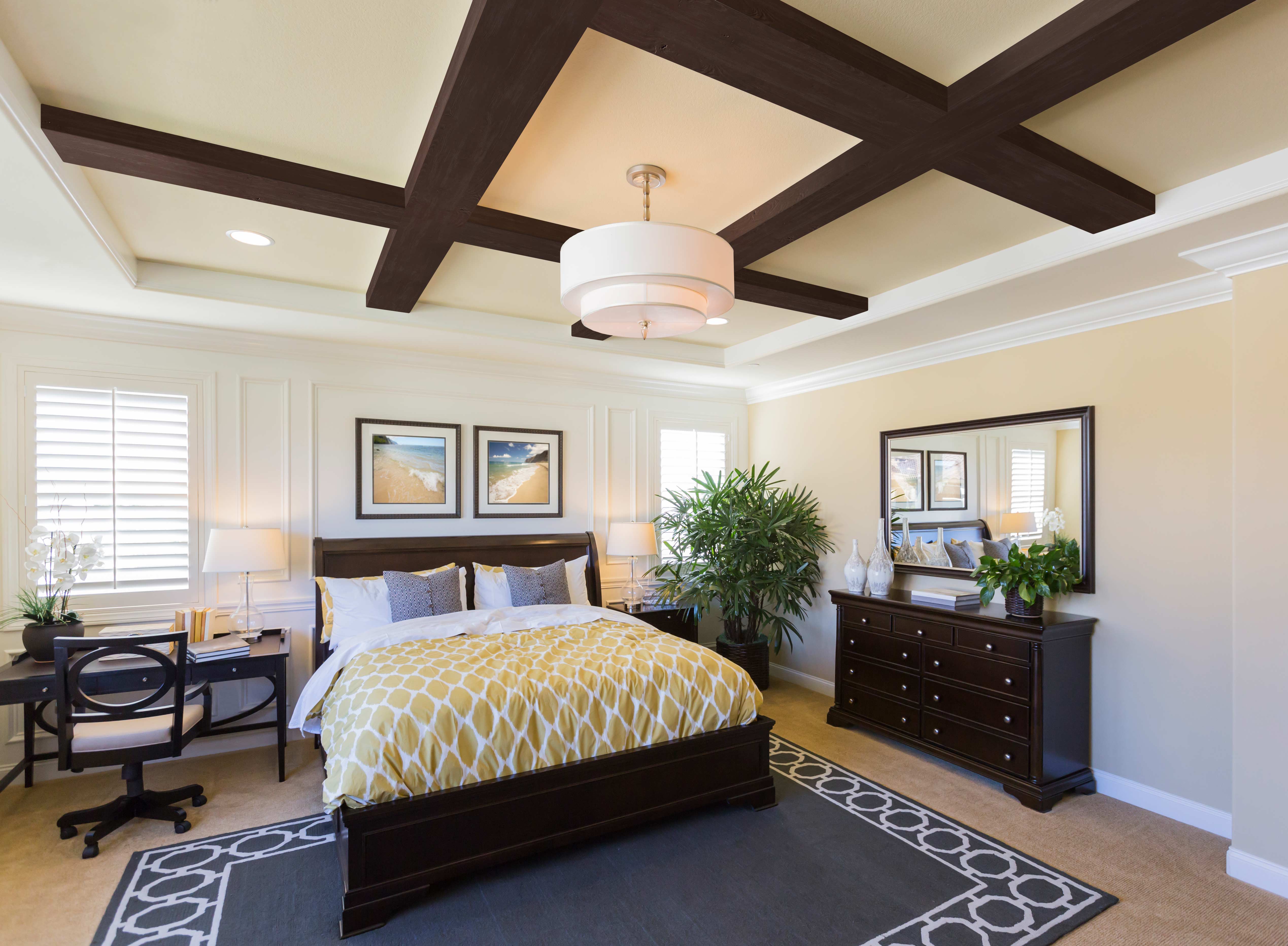 AZ Faux Old Barn Faux Wood Beams in Fresh Coffee in a crisscross position on the bedroom ceiling.